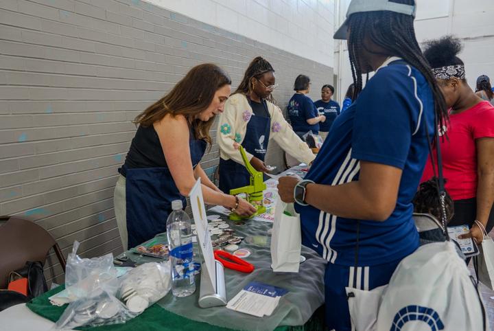 Families and partners at the resource fair tables